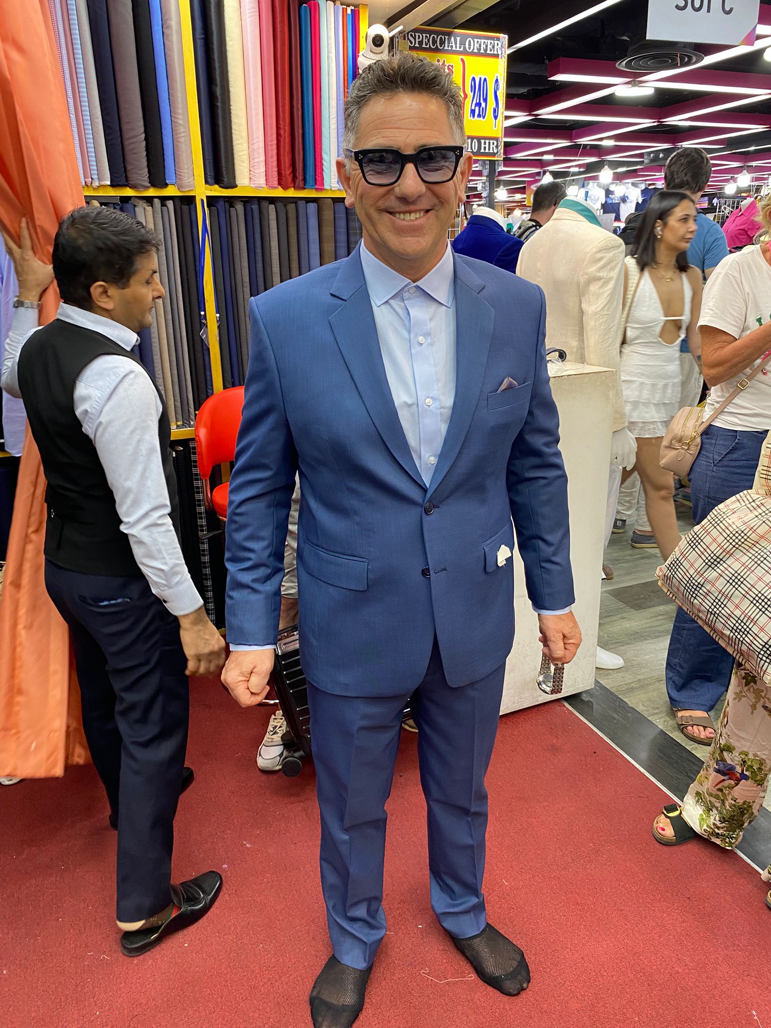 Happy client in custom tailored suit at King Fashion Uni Bangkok
